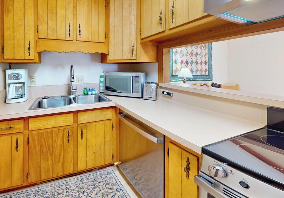 Kitchen with garbage disposal and dishwasher