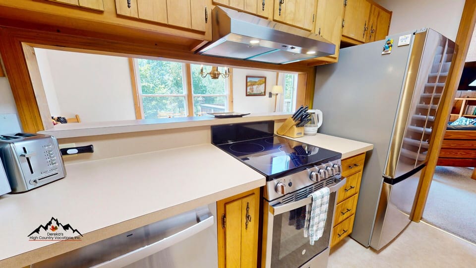 Kitchen with window to dining area