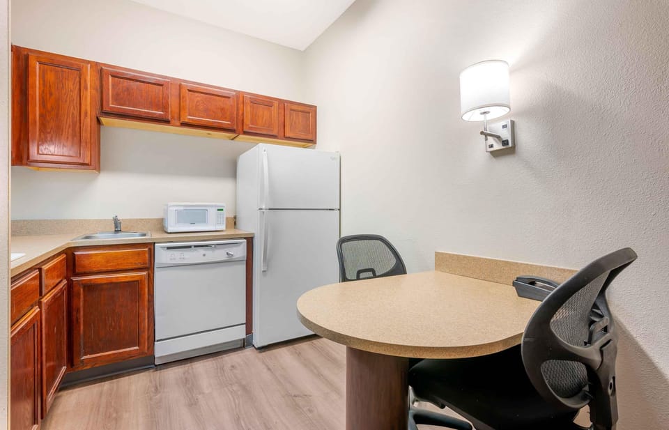 Suite, 2 Double Beds, Non Smoking | Private kitchen | Coffee/tea maker, fridge, microwave, stovetop