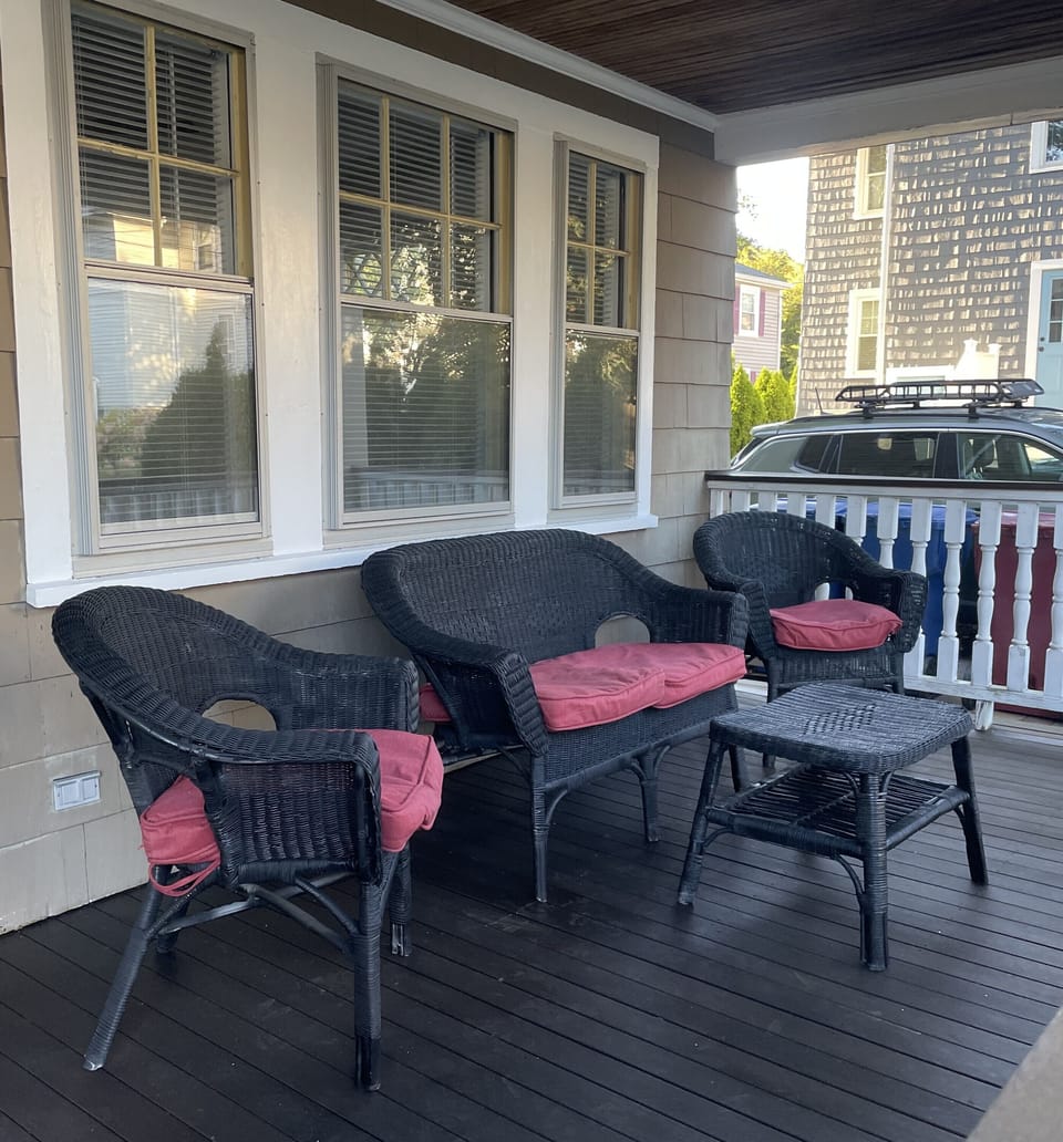 Relax on the front porch with morning coffee or an afternoon cocktail