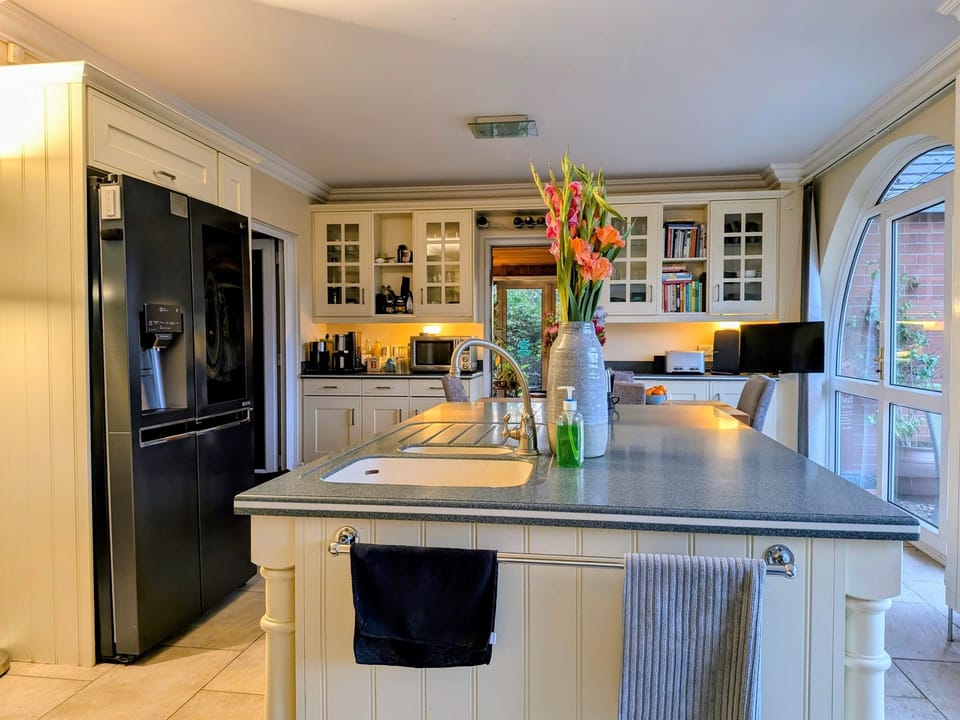 Wealth of chefs tools appliances. Extensive serving and dinnerware.