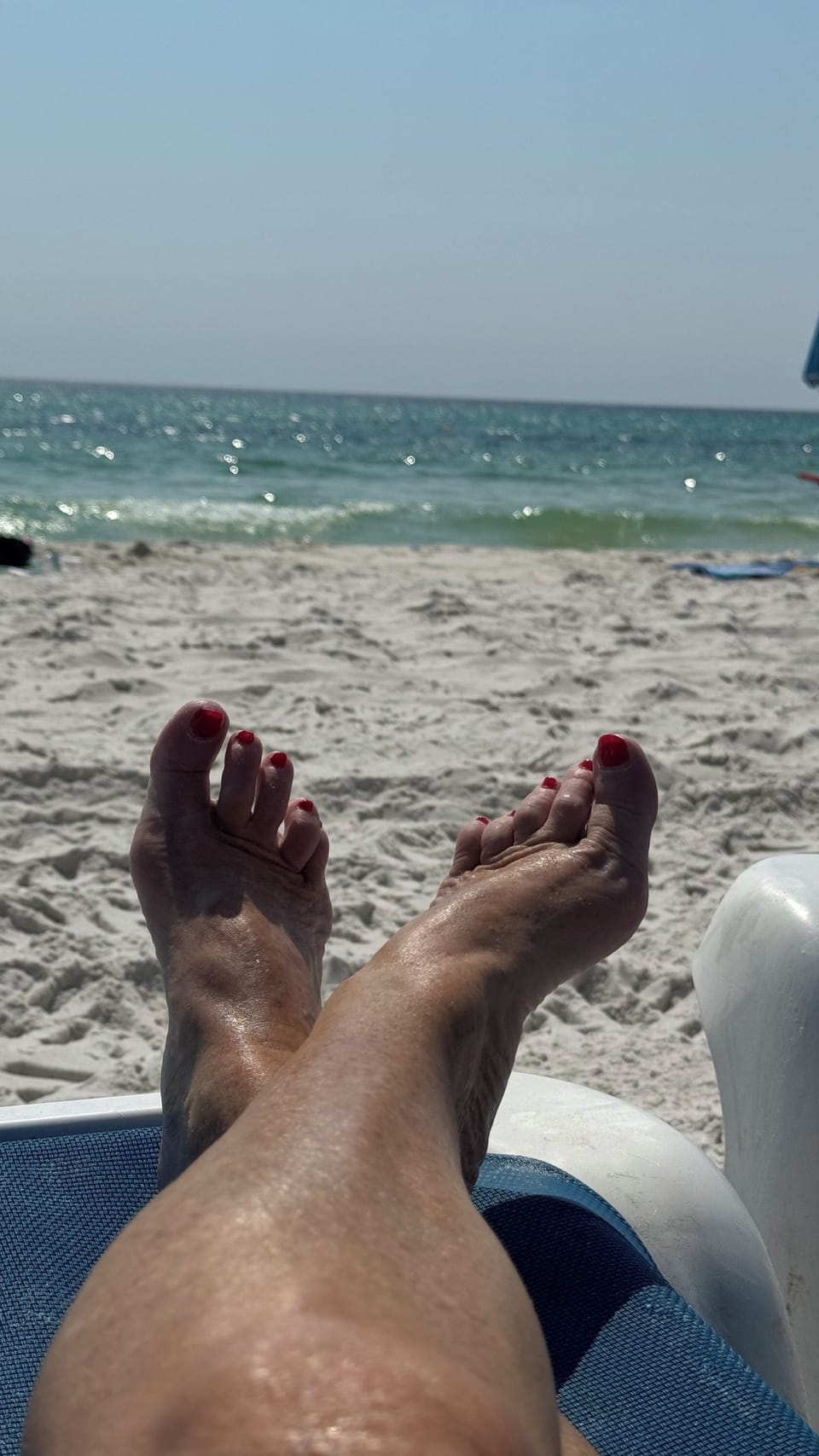 Relax on the sugary white sand and watch the waves roll in