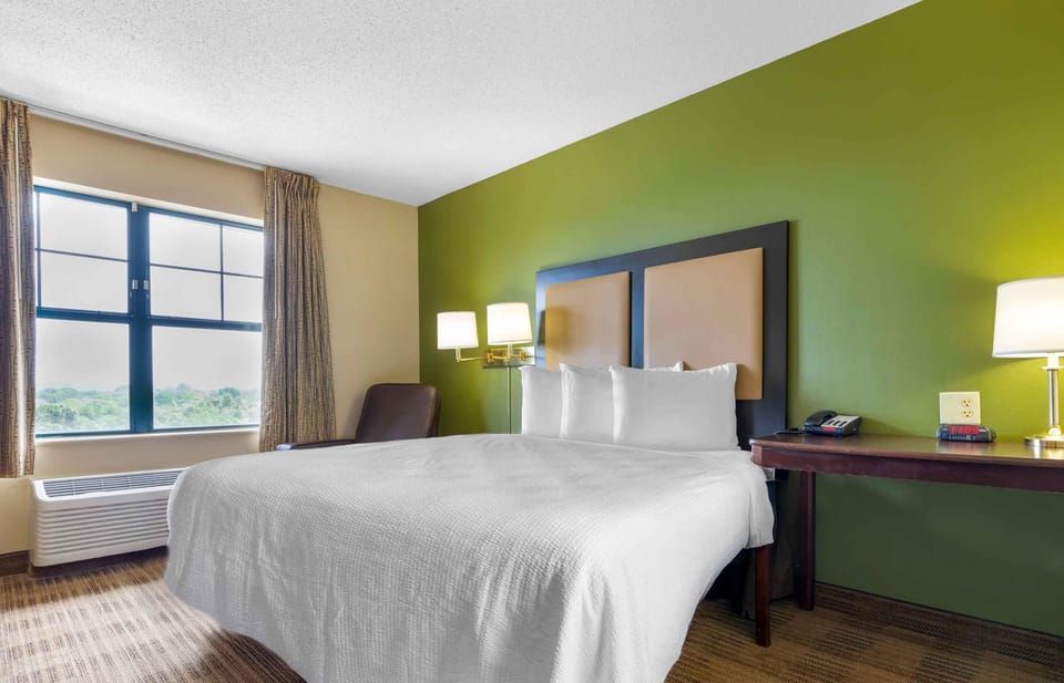 Studio, 1 Queen Bed, Non Smoking | Desk, laptop workspace, blackout drapes, iron/ironing board