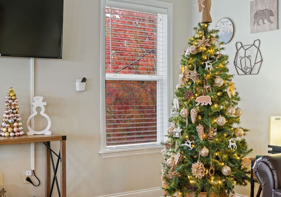 Festive decorated Christmas tree adding seasonal living room charm