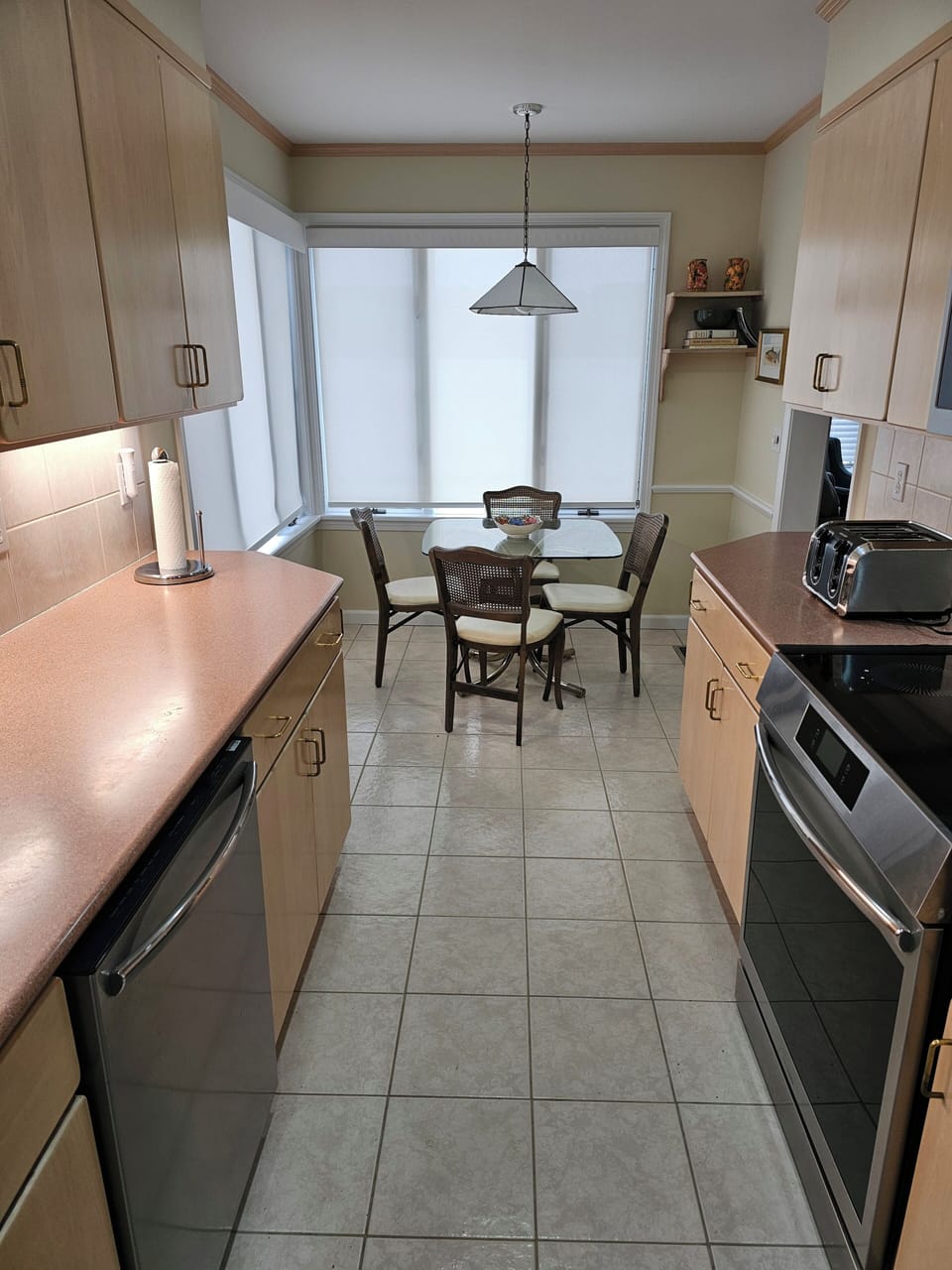Kitchen features dining nook for 4 with great lake views.