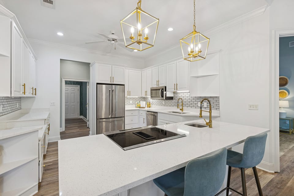The modern, clean, aesthetic kitchen is designed for preparing the perfect meal