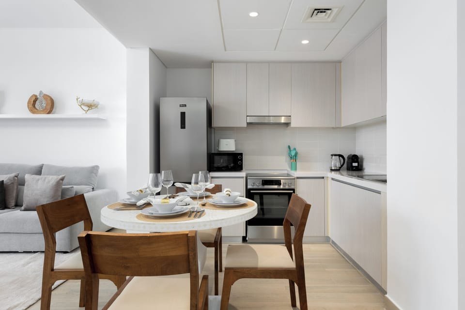 Deluxe Apartment, Non Smoking, Canal View | In-room dining