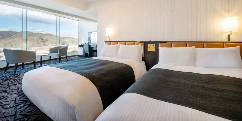 Twin Room, Non Smoking | Desk, laptop workspace, blackout drapes, free WiFi