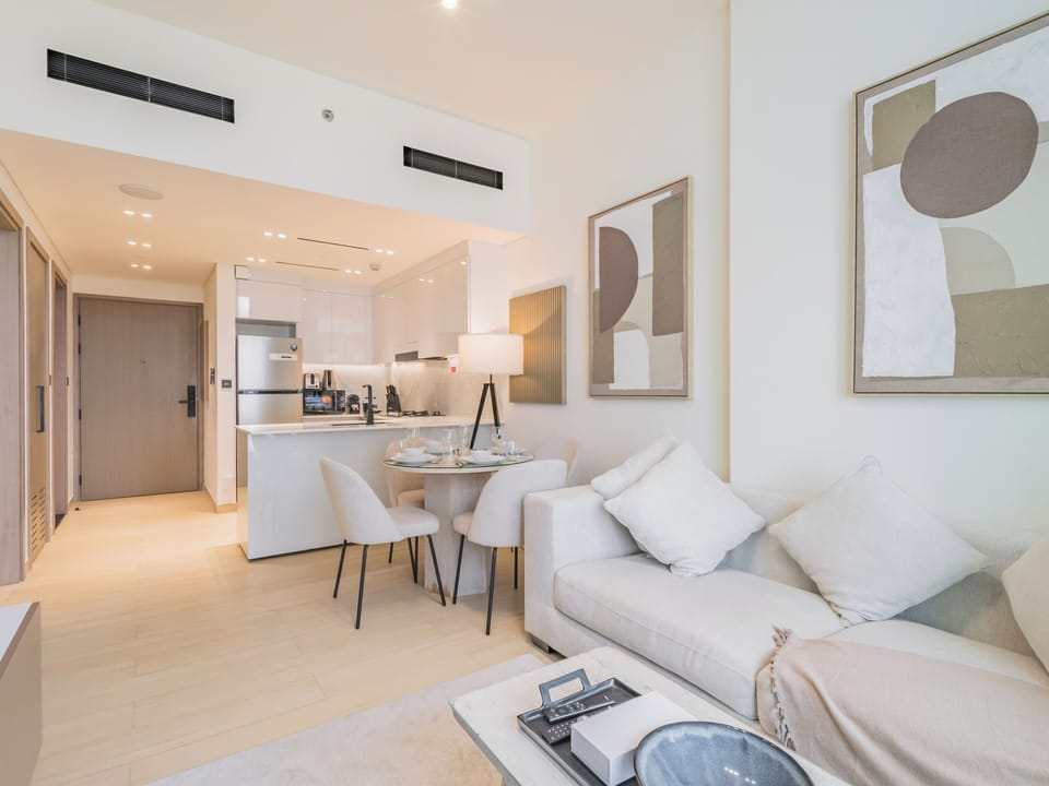 Deluxe Apartment, Balcony, City View | Living area | 55-inch Smart TV with digital channels