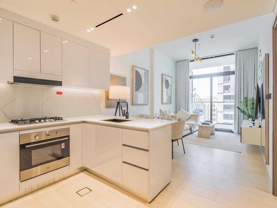 Deluxe Apartment, Balcony, City View | Living area | 55-inch Smart TV with digital channels