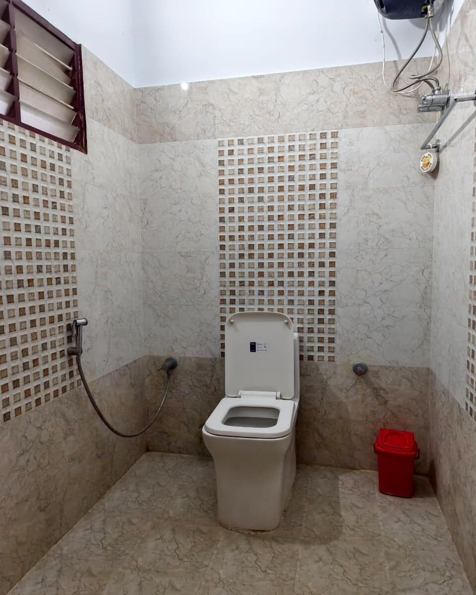 Deluxe Quadruple Room | Bathroom | Shower