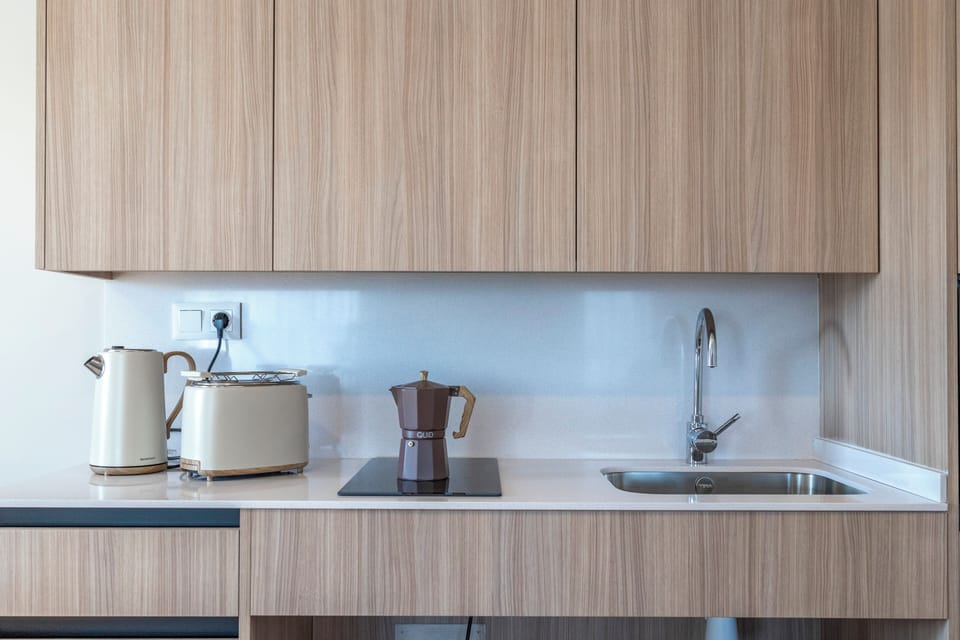 Apartment, Garden View | Private kitchen | Highchair