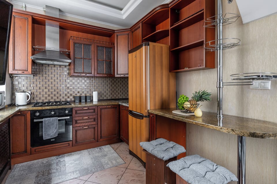 Comfort Apartment, City View | Private kitchen | Full-size fridge, microwave, oven, stovetop