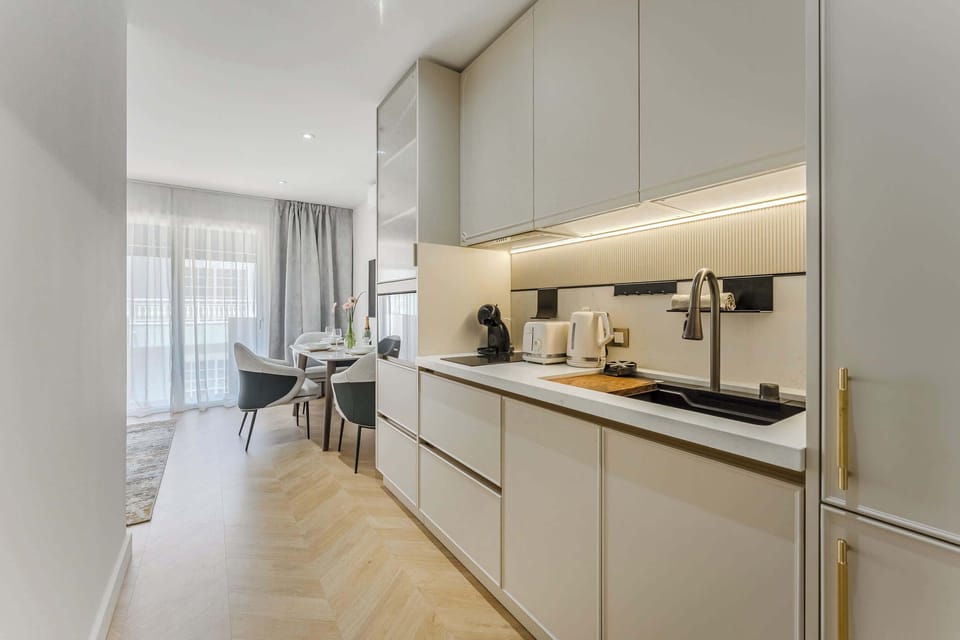 Seamless Kitchen & Dining Flow – Fully Equipped with Premium Appliances and Sleek Finishes