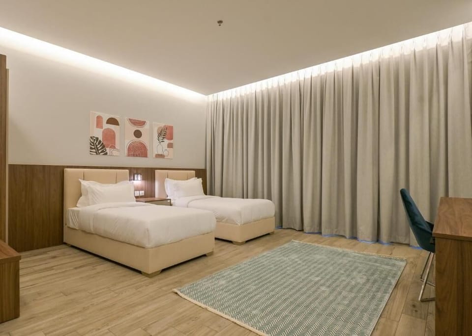 Suite, 2 Bedrooms | Premium bedding, in-room safe, iron/ironing board, cribs/infant beds