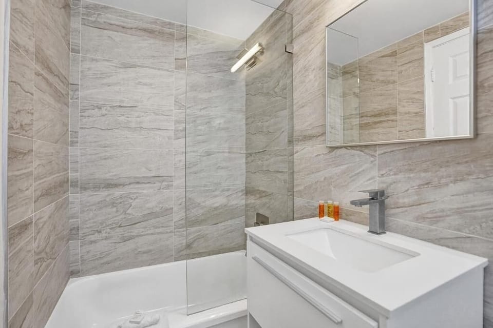 Refresh in a spotless bath with sleek, modern finishes.