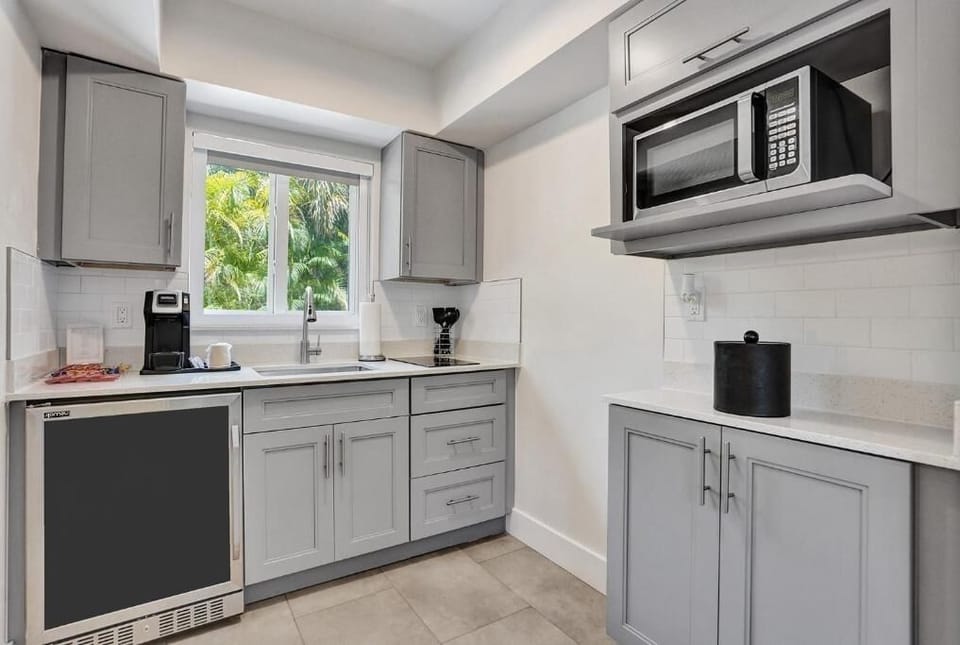 Unwind after outings with convenient appliances and ample cabinetry.