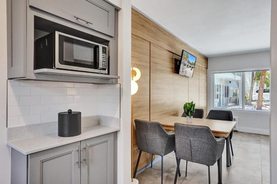 Gather for relaxed meals in a chic, open-plan dining nook.