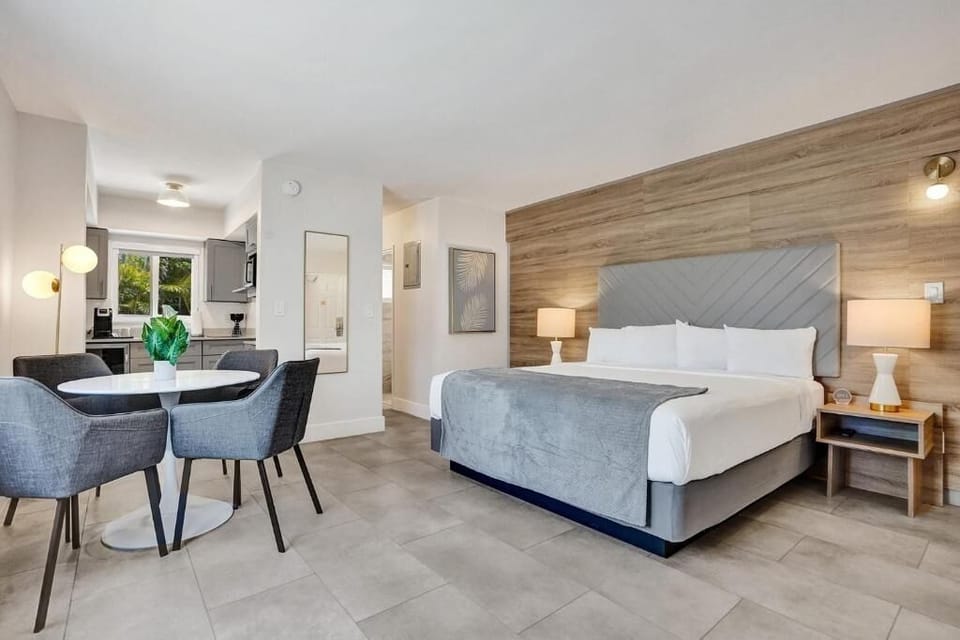 Stretch out on a plush bed in a calm, airy studio.