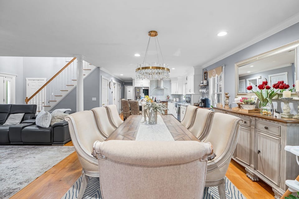 Formal dining room with seating for 8 guests, perfect for memorable dinners.