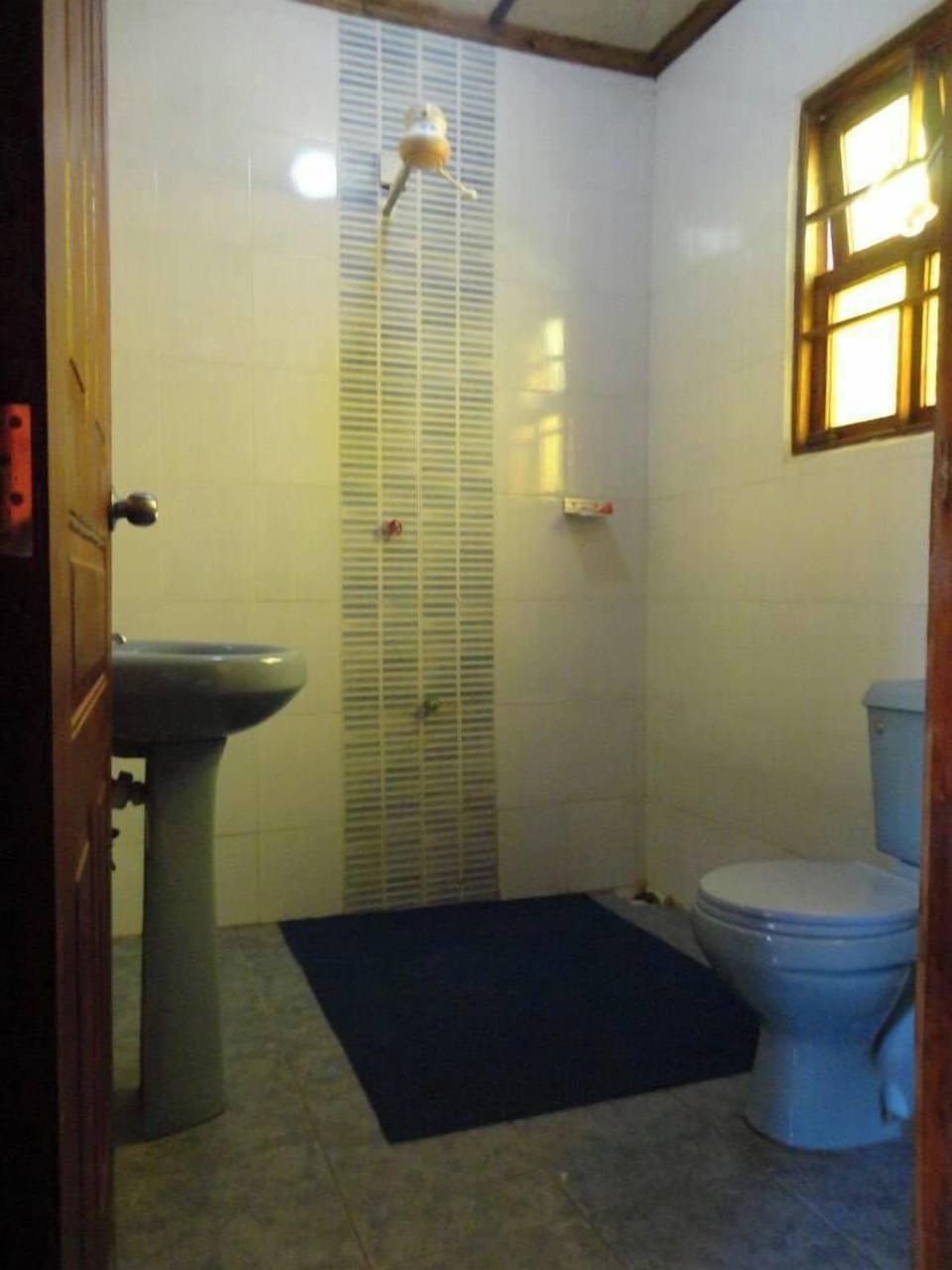 Shower, slippers, towels, soap