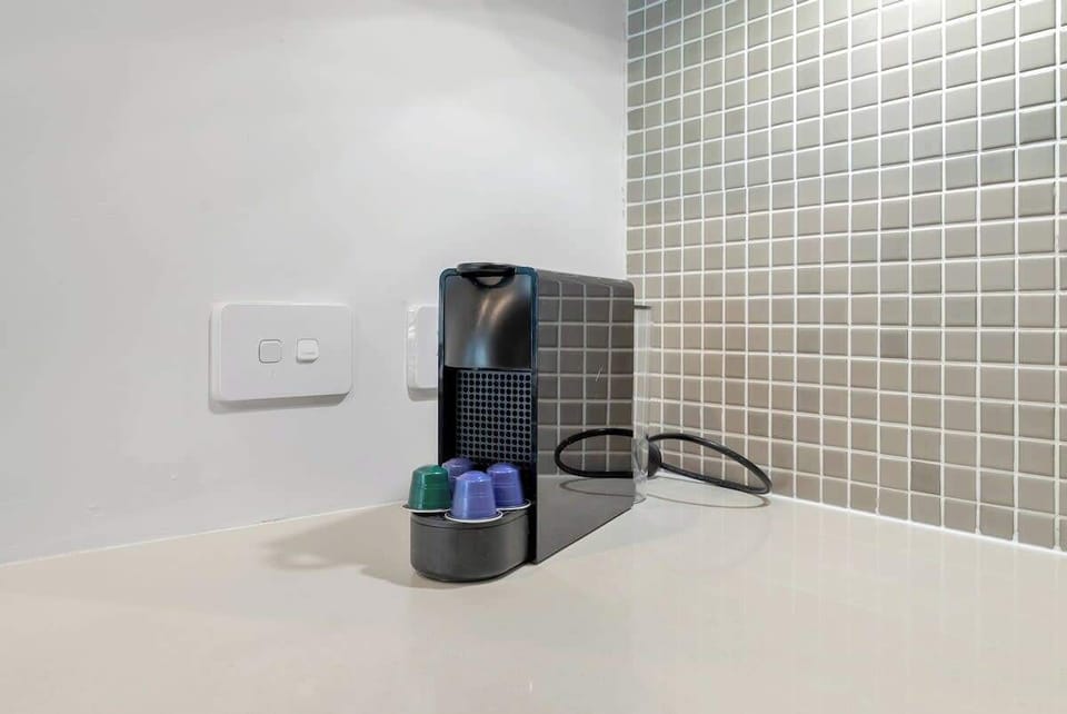 There is a coffee machine for your morning rituals.