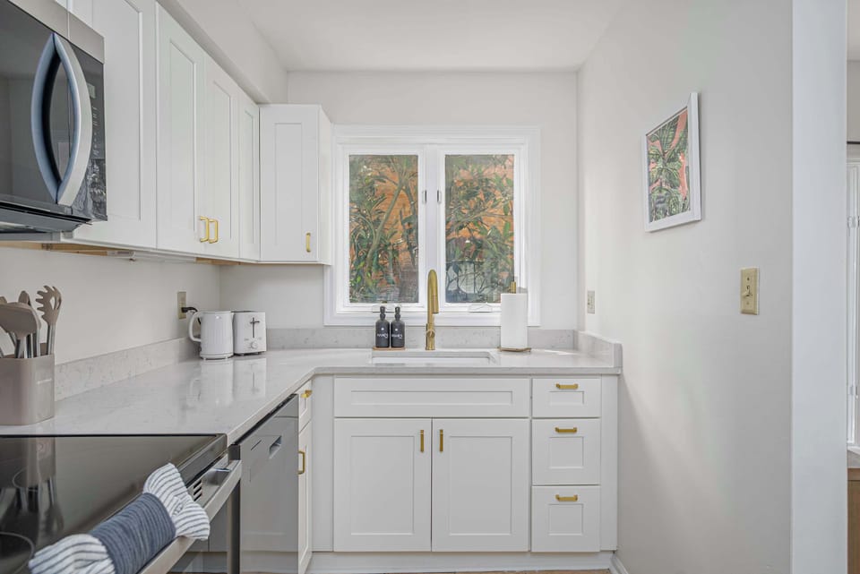 This kitchen sink offers a calming window view, adding comfort to everyday routines!