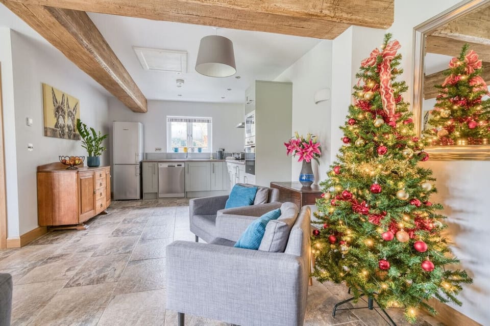 Living and dining room dressed for the holidays