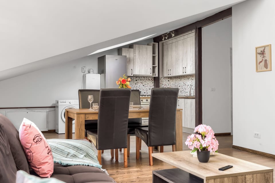Family Apartment, 2 Bedrooms, Balcony, City View | Living area | 40-cm flat-screen TV with cable channels