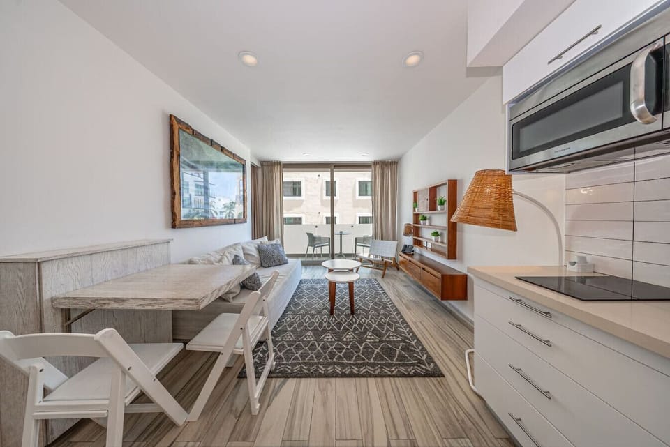 Bright lounge with natural light and cozy vibes.