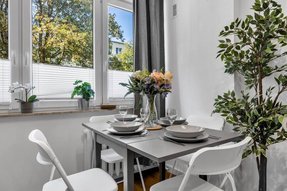 Living Room with Sofa, Smart TV and Dining Table | Book Now with RENTUJEMY.COM