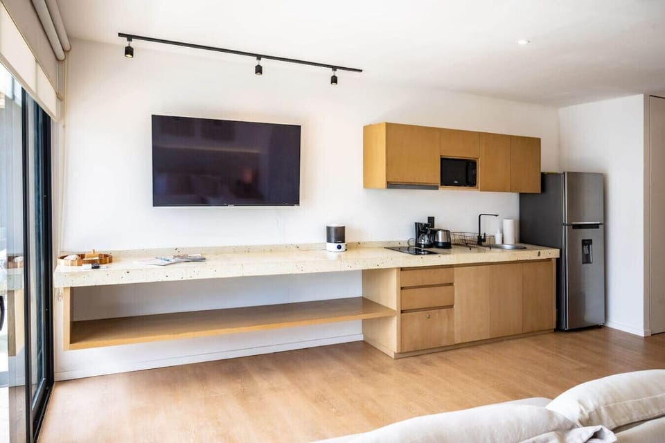 Cook, dine, and relax in this bright and inviting kitchen and dining space