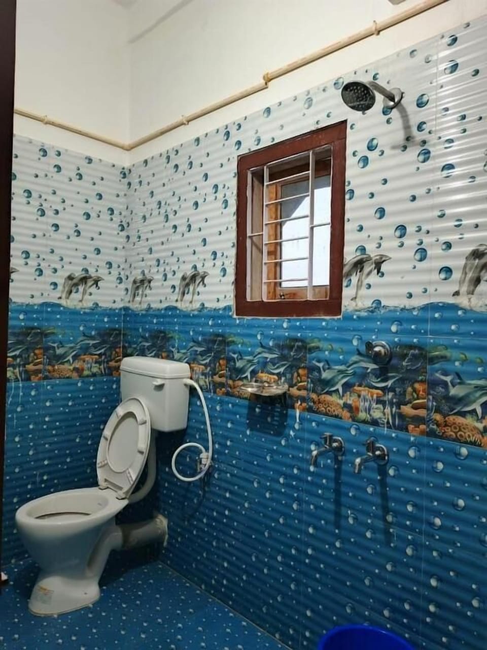 Shower, free toiletries, slippers, towels