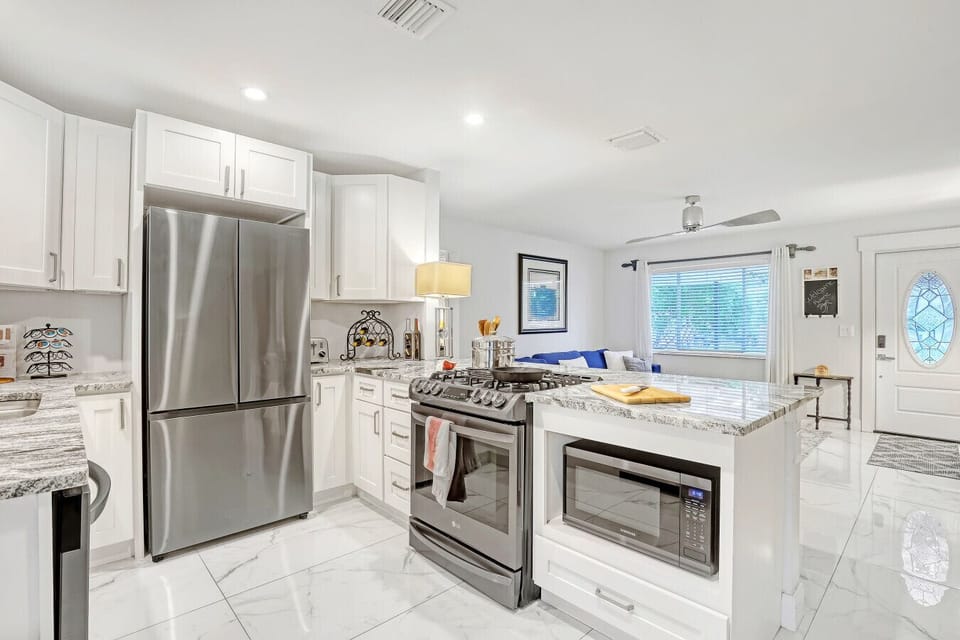 Our recently updated kitchen with Gas stove & oven, large French door refrigerator, microwave and dishwasher. Plus a full arrange of cookware with what you need to make family meals.