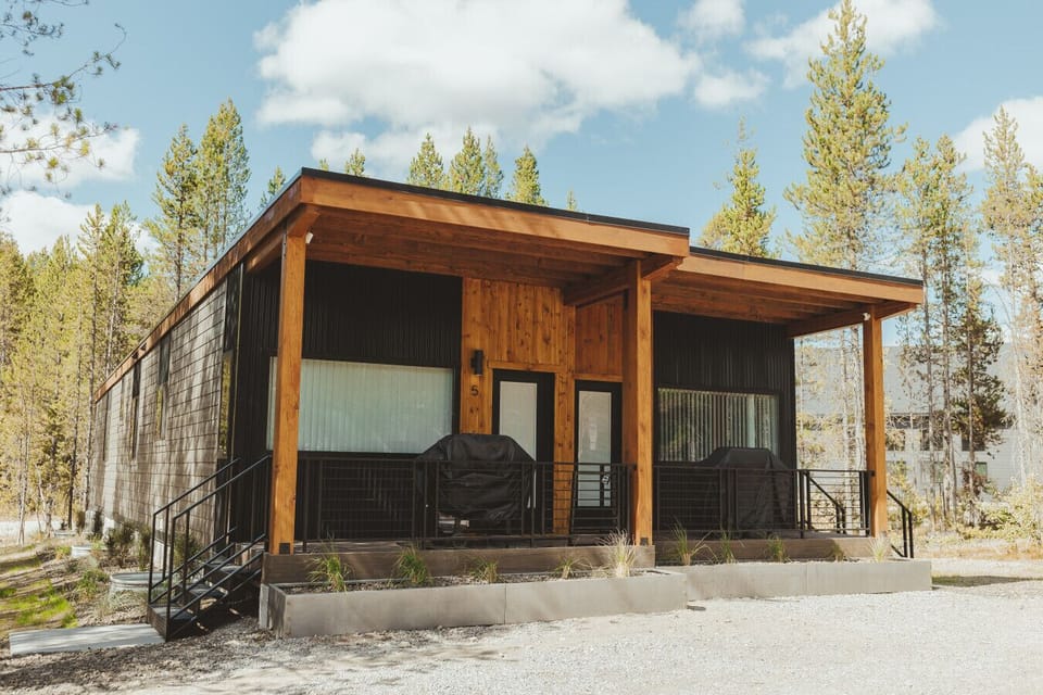 Modern exterior with pine trees surrounding you. Yes, it does smell like pine. <3
