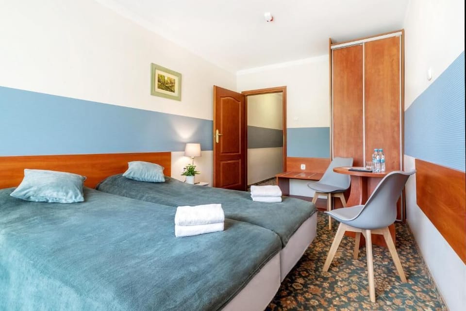 Standard Twin Room, Balcony, Garden View | Laptop workspace, free WiFi