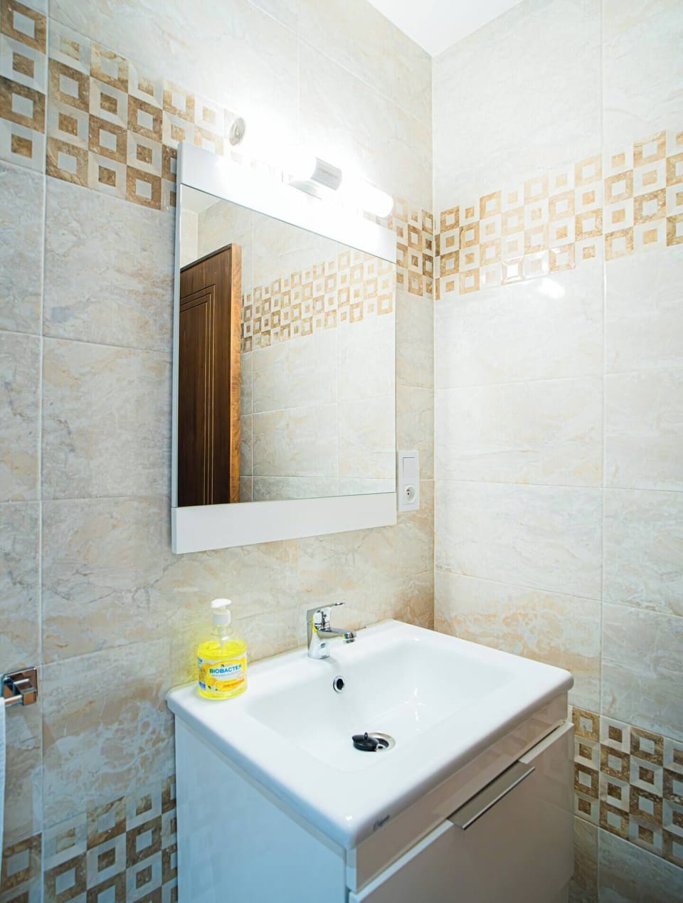 Private room featuring a convenient personal sink.