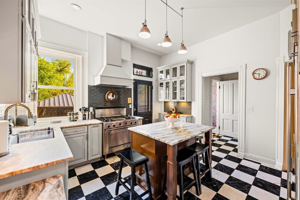 A well-stocked, elegant kitchen featuring high-end appliances — perfect for creating memorable meals with family and friends.