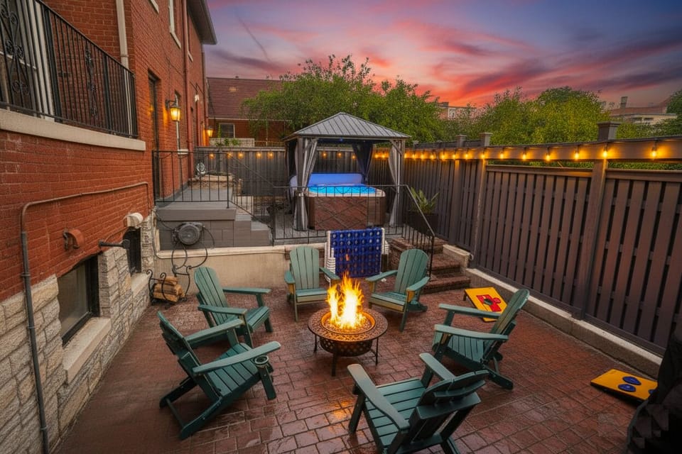A cute and cozy backyard retreat with a bubbling hot tub, BBQ grill, firepit, and fun games!