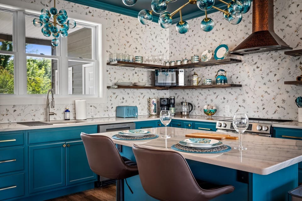 The kitchen was designed to be both beautiful and functional, whether you're preparing a quick breakfast or a special dinner together.
