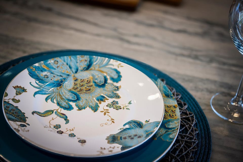Beautiful serving pieces and thoughtful touches create a home that feels welcoming.