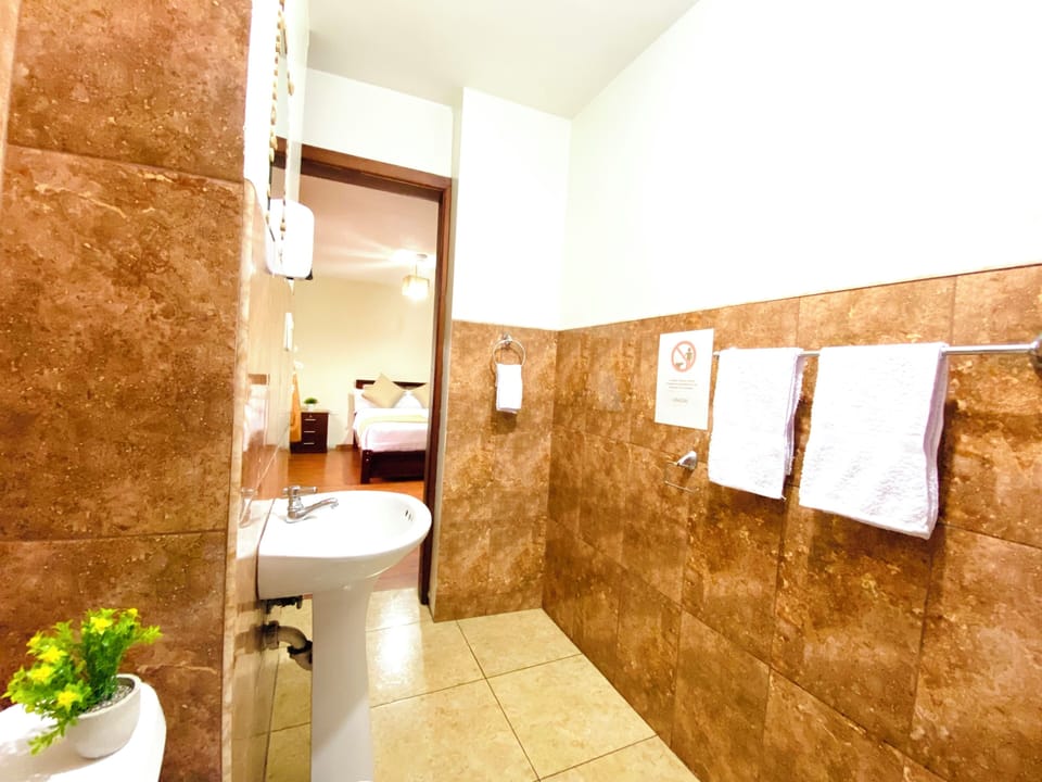 Shower, towels, soap, shampoo