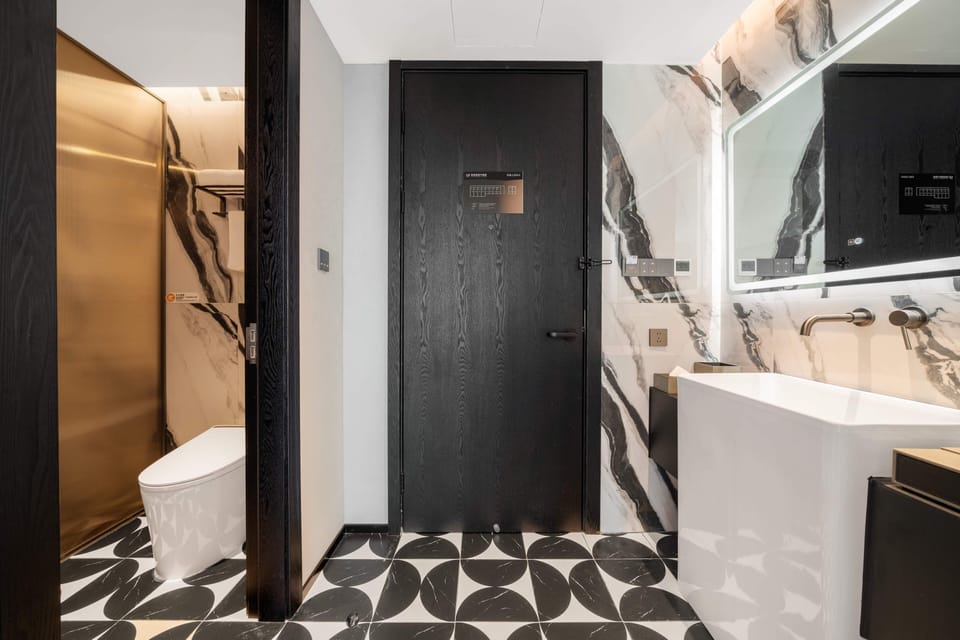 Comfort Double Room, Patio, Courtyard View | Bathroom | Shower, hair dryer, slippers, towels