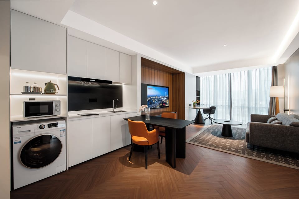 Superior Suite, City View | Private kitchen | Fridge, electric kettle, highchair
