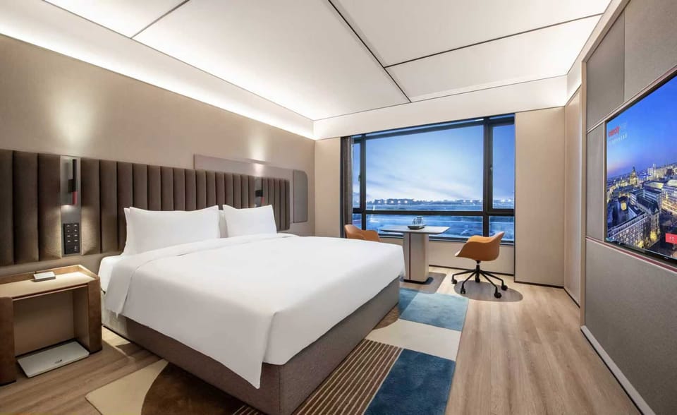 Basic Double Room, 1 King Bed | Down comforters, free minibar, desk, laptop workspace