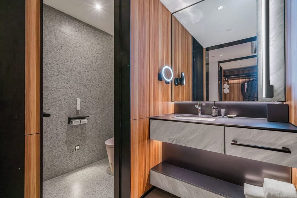 Shower, rainfall showerhead, designer toiletries, hair dryer