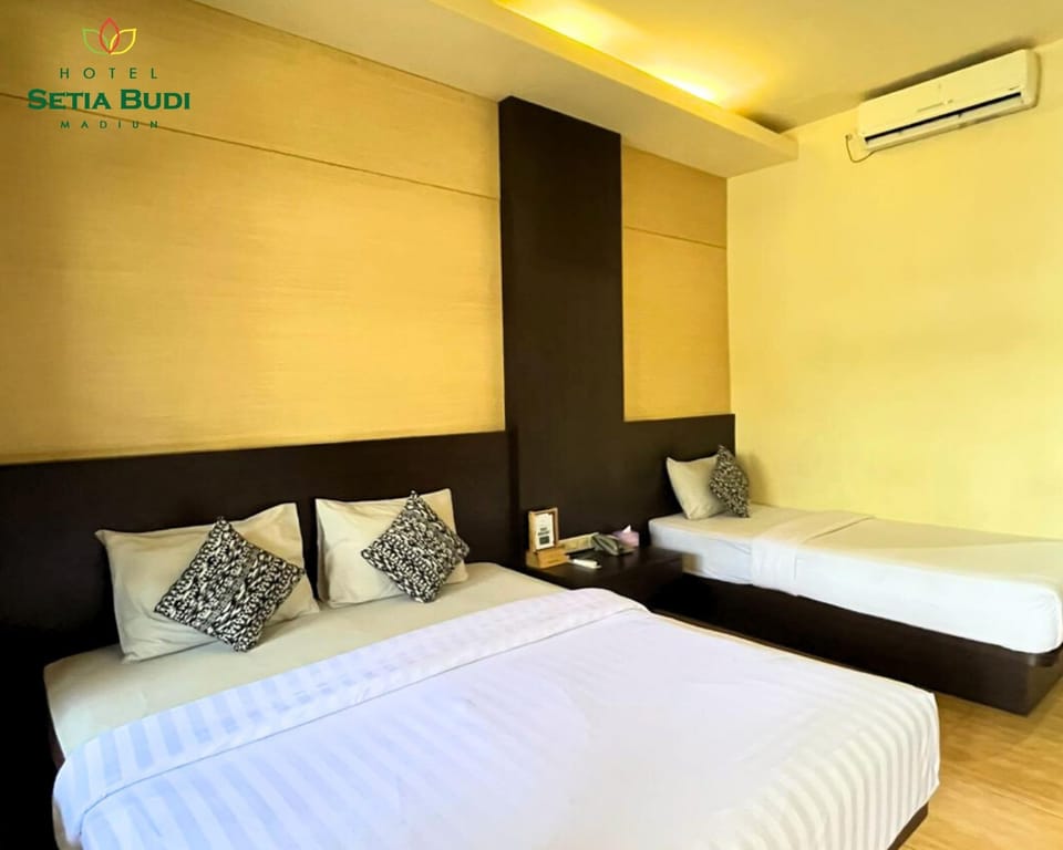 Triple Room, Patio, City View | Desk, laptop workspace, free WiFi