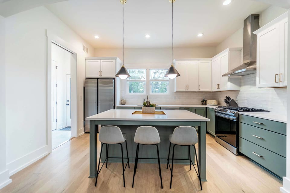 Enjoy cooking in the spacious kitchen area complete with large kitchen island, stainless steel appliances and fully stocked with all cookware and utensils.