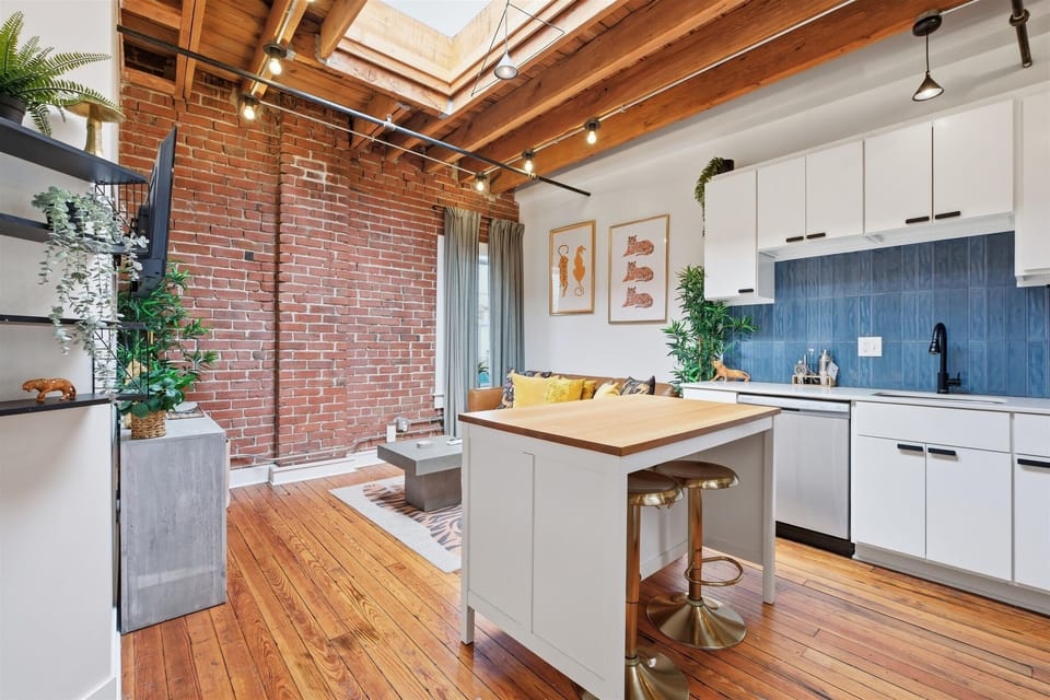 Open concept apartment in the heart of downtown KC, with exposed brick and natural light