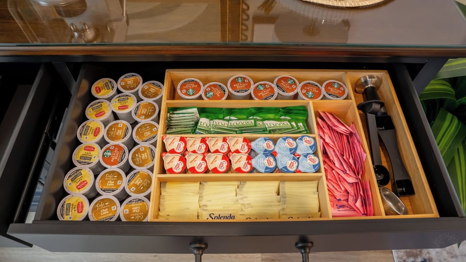 Dedicated Coffee Bar — Fully outfitted with nespresso, Delonghi, latte frother, syrups & mugs for café-style mornings.